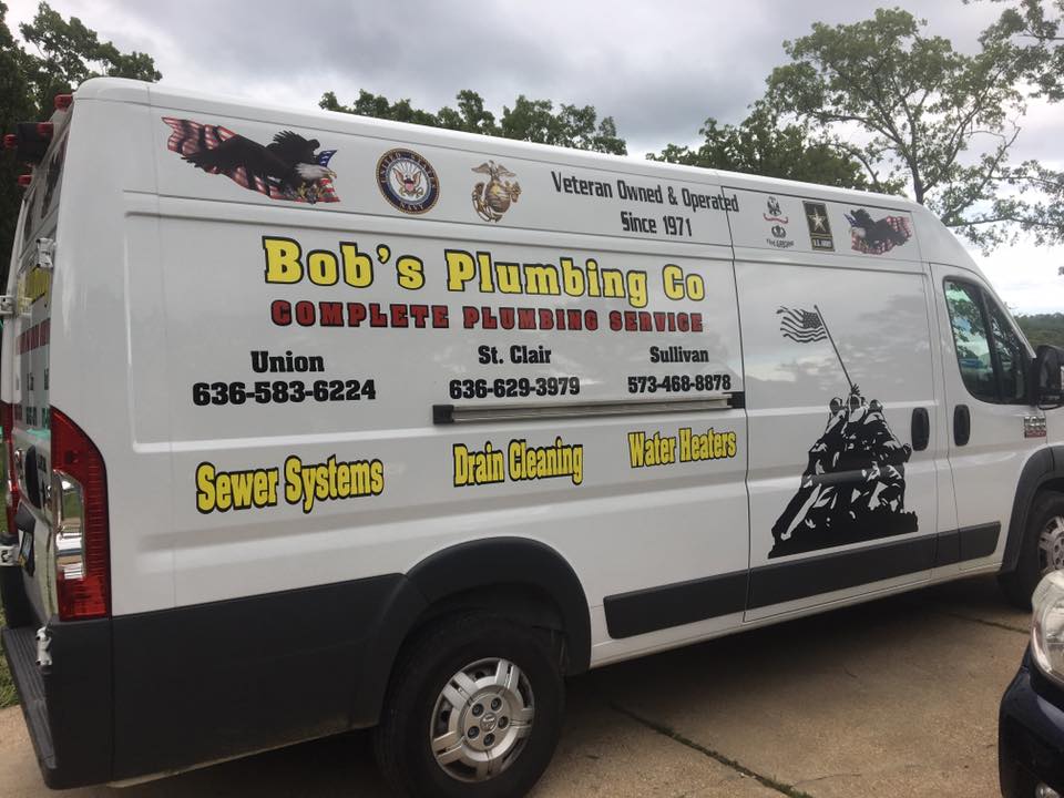 Bob’s Plumbing Company’s branded service van, with local phone numbers and veteran owned insignia